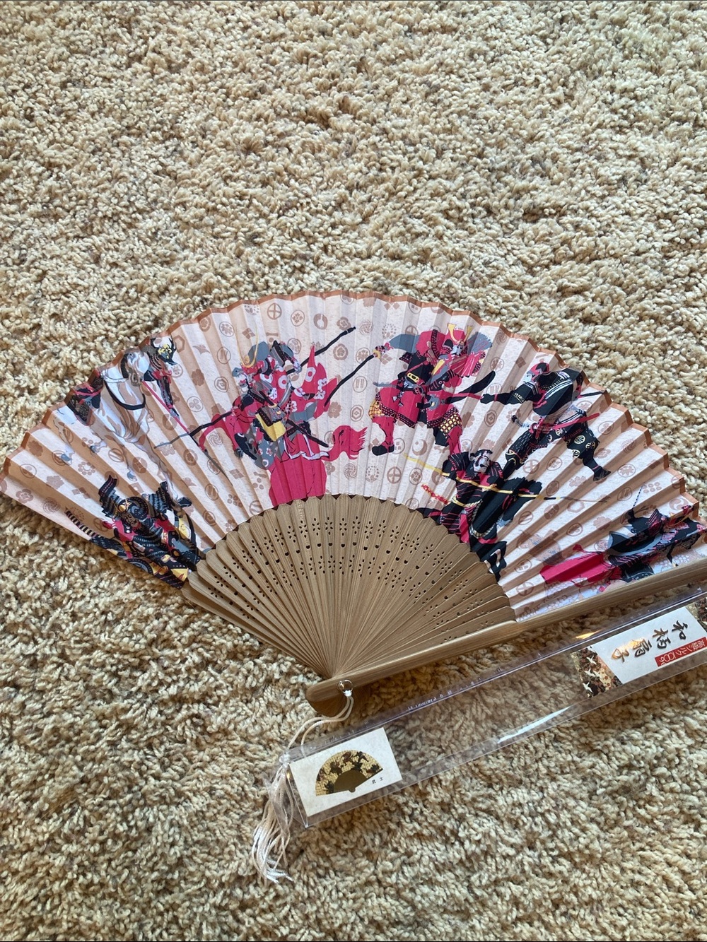 Source Unknown Pink and Tan Folding Fan with Samurai Design